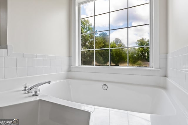 501 Llewellyn Ct, Jenkinsburg, GA 30234 - full bathroom featuring plenty of natural light and a bath