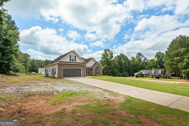 501 Llewellyn Ct, Jenkinsburg, GA 30234 - view of front of house with brick siding, driveway, a garage, and a front lawn