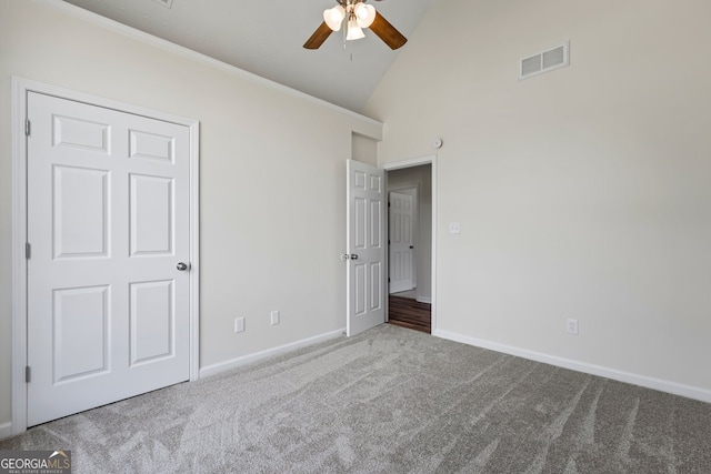 501 Llewellyn Ct, Jenkinsburg, GA 30234 - unfurnished bedroom with carpet flooring, high vaulted ceiling, and ceiling fan