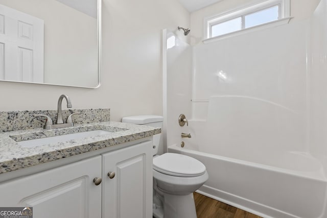501 Llewellyn Ct, Jenkinsburg, GA 30234 - full bathroom featuring vanity, wood finished floors, and shower / bathtub combination