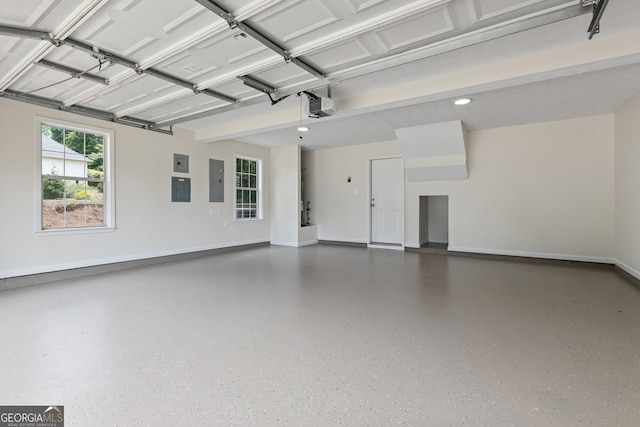 501 Llewellyn Ct, Jenkinsburg, GA 30234 - garage with a garage door opener, electric panel, and recessed lighting
