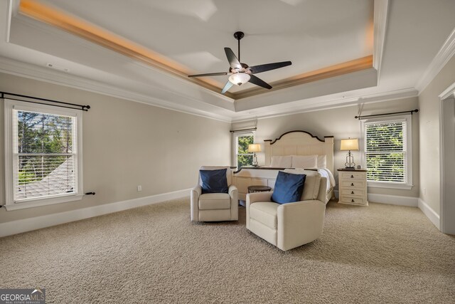 560 Arcaro Dr, Milton, GA 30004 - bedroom featuring a raised ceiling, crown molding, light colored carpet, multiple windows, and ceiling fan