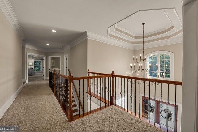 560 Arcaro Dr, Milton, GA 30004 - hall with a chandelier, an upstairs landing, carpet, crown molding, and recessed lighting
