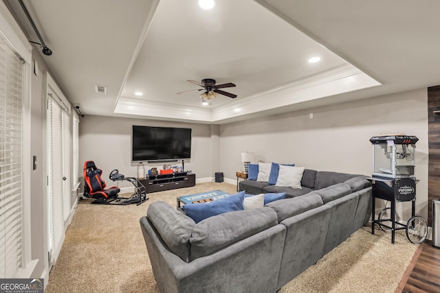 560 Arcaro Dr, Milton, GA 30004 - living area with a tray ceiling, ceiling fan, ornamental molding, recessed lighting, and wood finished floors