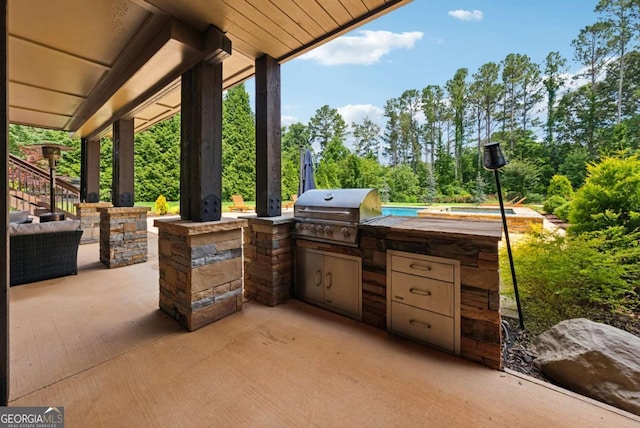 560 Arcaro Dr, Milton, GA 30004 - view of patio with exterior kitchen