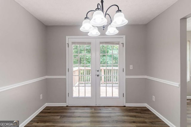 1404 Lancaster Ct, Mcdonough, GA 30252 - doorway to outside featuring a chandelier, french doors, and dark wood finished floors