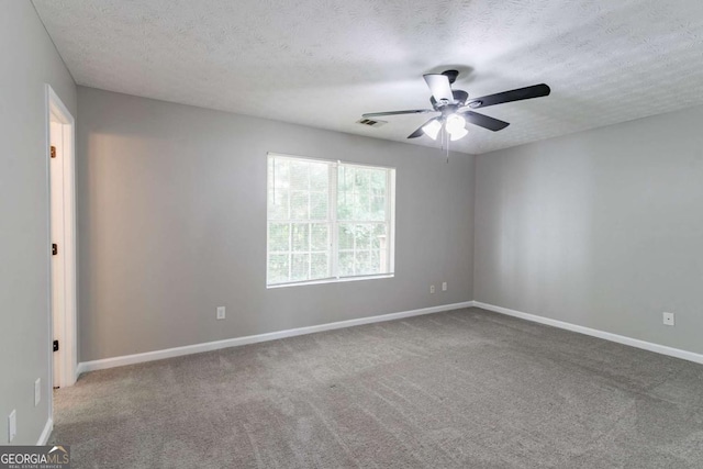 1404 Lancaster Ct, Mcdonough, GA 30252 - carpeted spare room with ceiling fan and a textured ceiling
