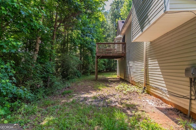 1404 Lancaster Ct, Mcdonough, GA 30252 - view of yard featuring a wooden deck