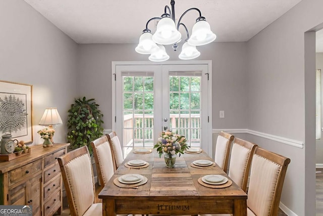 1404 Lancaster Ct, Mcdonough, GA 30252 - dining space with a chandelier and french doors