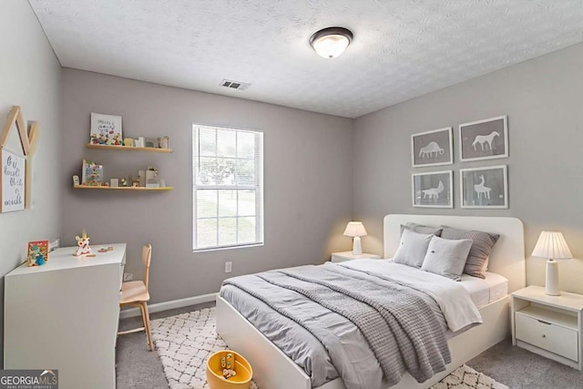 1404 Lancaster Ct, Mcdonough, GA 30252 - bedroom with carpet floors and a textured ceiling