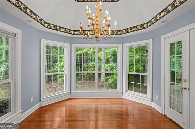2333 Old Newnan Rd, Carrollton, GA 30116 - unfurnished sunroom with a chandelier and french doors