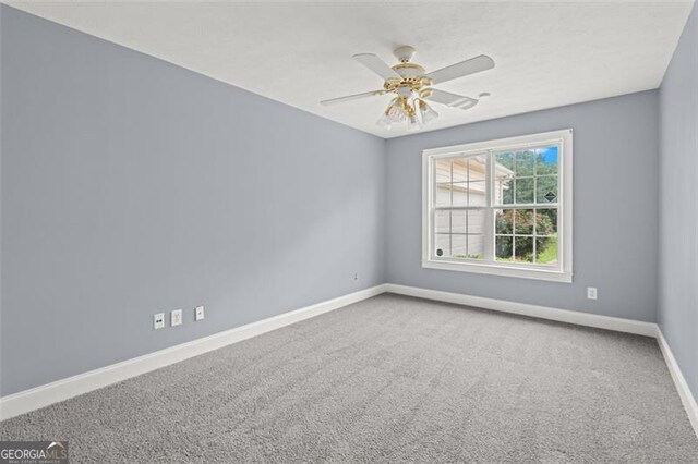 2333 Old Newnan Rd, Carrollton, GA 30116 - carpeted empty room featuring baseboards and a ceiling fan