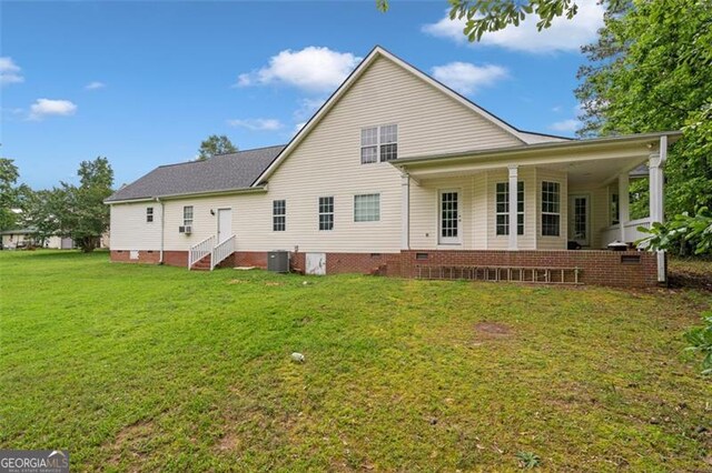 2333 Old Newnan Rd, Carrollton, GA 30116 - rear view of property featuring a lawn and crawl space