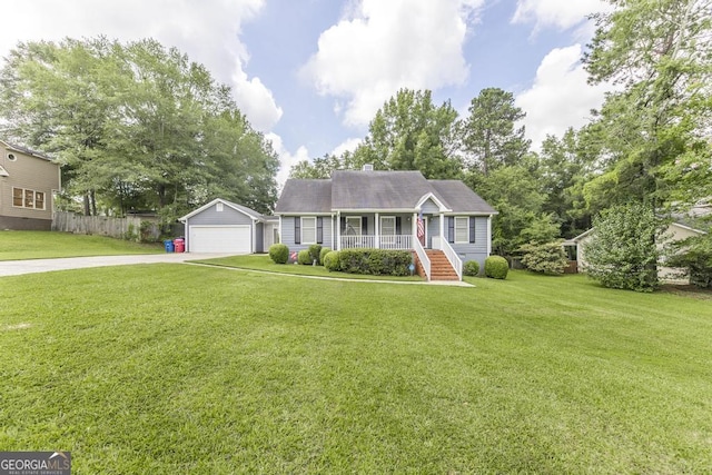 632 Chastain Pl, Macon, GA 31210 - view of front of house with a porch, a garage, an outdoor structure, and a chimney
