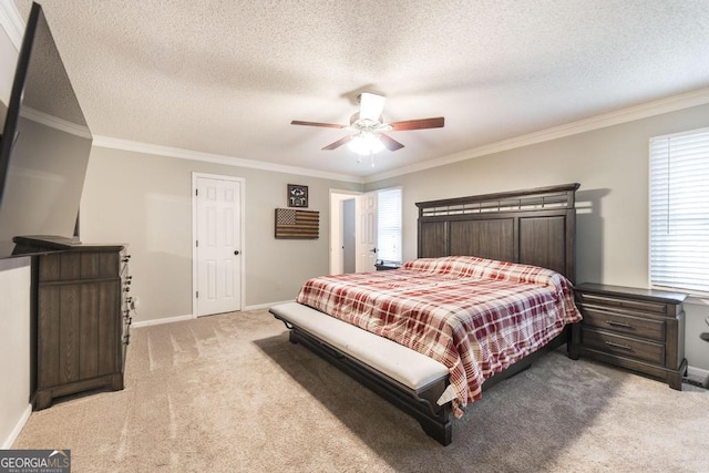 632 Chastain Pl, Macon, GA 31210 - bedroom featuring light colored carpet, crown molding, a textured ceiling, and a ceiling fan