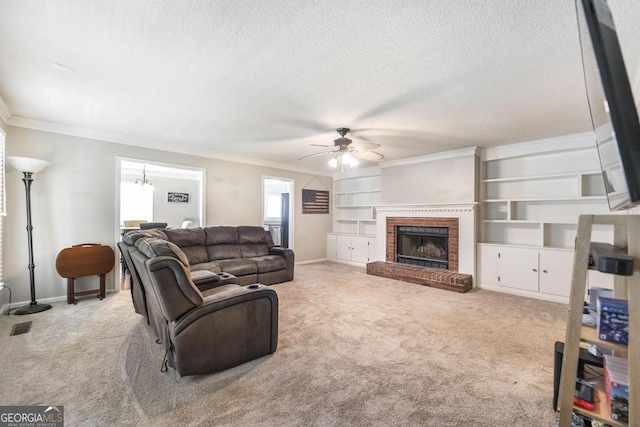 632 Chastain Pl, Macon, GA 31210 - carpeted living room with a ceiling fan, ornamental molding, a textured ceiling, and a fireplace