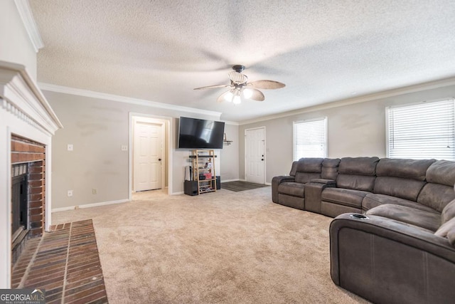 632 Chastain Pl, Macon, GA 31210 - carpeted living room with a ceiling fan, a fireplace, crown molding, and a textured ceiling
