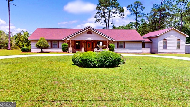 26 Ben Blvd, Swainsboro, GA 30401 - ranch-style house featuring a front lawn