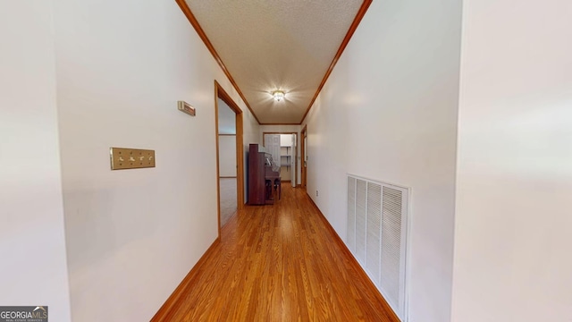 26 Ben Blvd, Swainsboro, GA 30401 - corridor with ornamental molding and light wood-style flooring