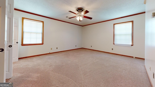 26 Ben Blvd, Swainsboro, GA 30401 - unfurnished room featuring light carpet, ornamental molding, ceiling fan, and a textured ceiling