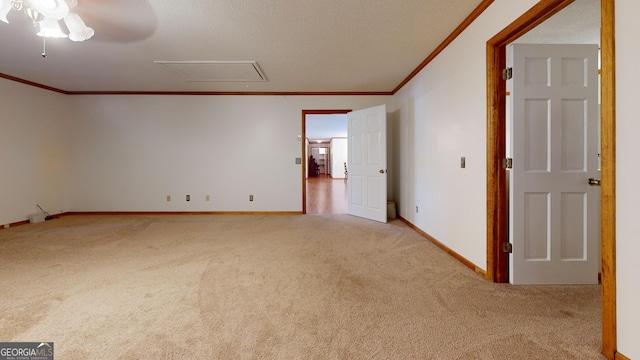 26 Ben Blvd, Swainsboro, GA 30401 - spare room featuring ornamental molding, light carpet, ceiling fan, and attic access