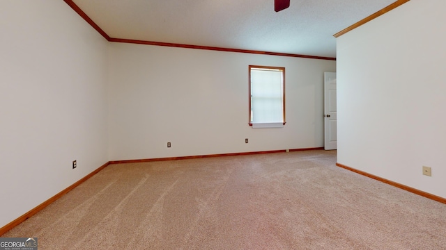 26 Ben Blvd, Swainsboro, GA 30401 - unfurnished room featuring ornamental molding, light colored carpet, and a ceiling fan