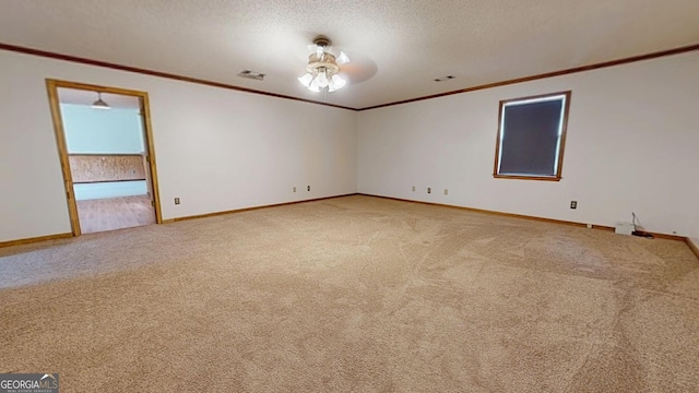 26 Ben Blvd, Swainsboro, GA 30401 - empty room with light carpet, ornamental molding, and a textured ceiling