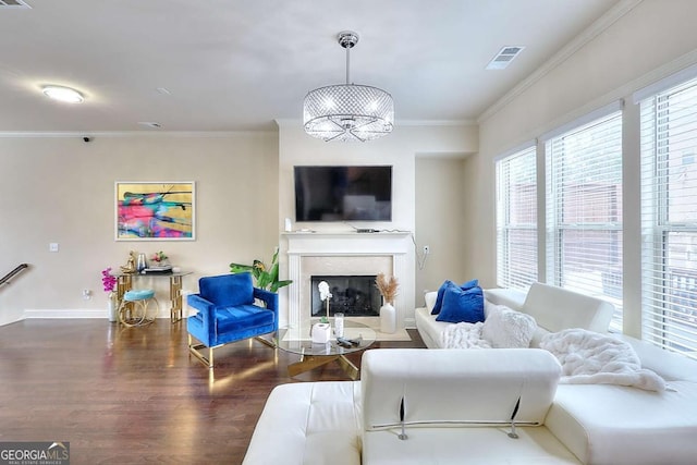 1306 Harris Way, Brookhaven, GA 30319 - living area featuring wood finished floors, a fireplace with flush hearth, and ornamental molding