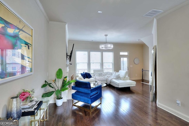1306 Harris Way, Brookhaven, GA 30319 - living area with ornamental molding, a chandelier, and wood finished floors