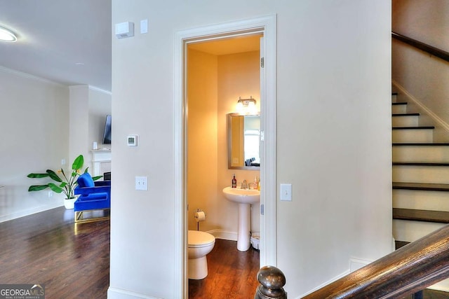 1306 Harris Way, Brookhaven, GA 30319 - stairway with wood finished floors, a fireplace, and ornamental molding
