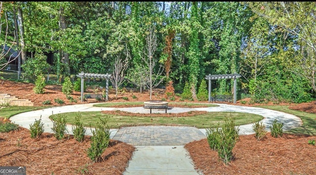 1306 Harris Way, Brookhaven, GA 30319 - view of home's community featuring an outdoor fire pit, a pergola, and a yard