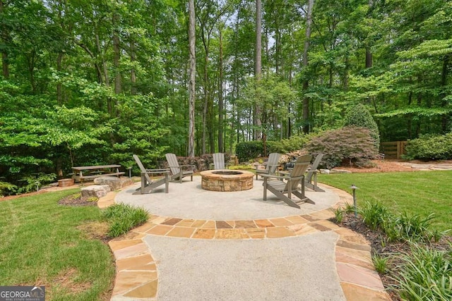 627 Apache Trl, Woodstock, GA 30189 - view of patio with a fire pit