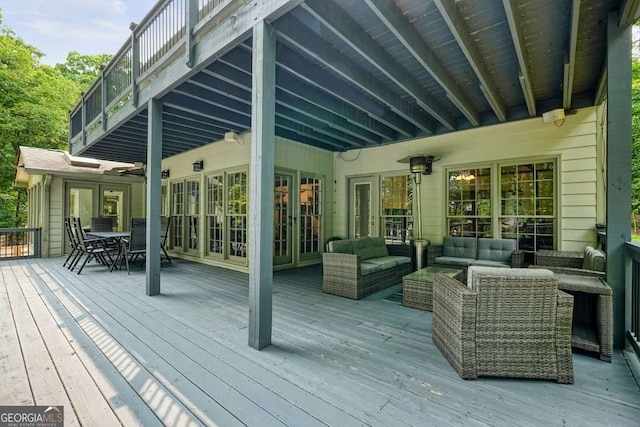 627 Apache Trl, Woodstock, GA 30189 - wooden deck featuring an outdoor living space, outdoor dining area, and french doors