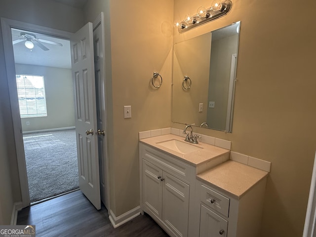 756 Glenshire Ct, Riverdale, GA 30274 - bathroom with vanity, a ceiling fan, and wood finished floors
