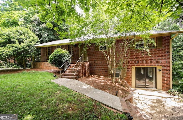 221 College Cir, Athens, GA 30605 - view of front of home with a front lawn and brick siding
