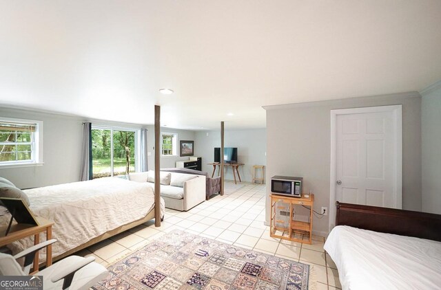 221 College Cir, Athens, GA 30605 - bedroom featuring multiple windows, light tile patterned flooring, ornamental molding, recessed lighting, and access to outside