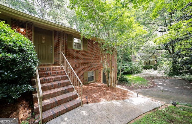 221 College Cir, Athens, GA 30605 - doorway to property with brick siding