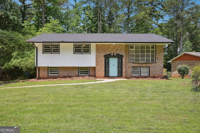 3611 Radcliffe Blvd, Decatur, GA 30034 - split foyer home featuring a front lawn and brick siding
