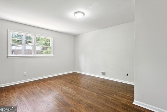 3611 Radcliffe Blvd, Decatur, GA 30034 - empty room with dark wood-style floors and baseboards