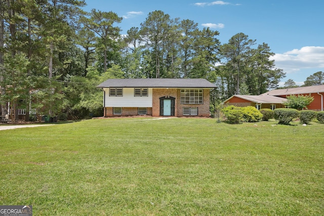 3611 Radcliffe Blvd, Decatur, GA 30034 - split foyer home featuring a front yard and brick siding