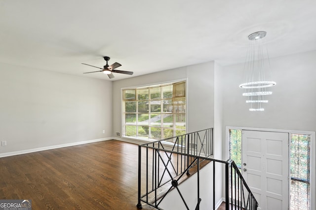 3611 Radcliffe Blvd, Decatur, GA 30034 - stairway with wood finished floors, a chandelier, and a ceiling fan