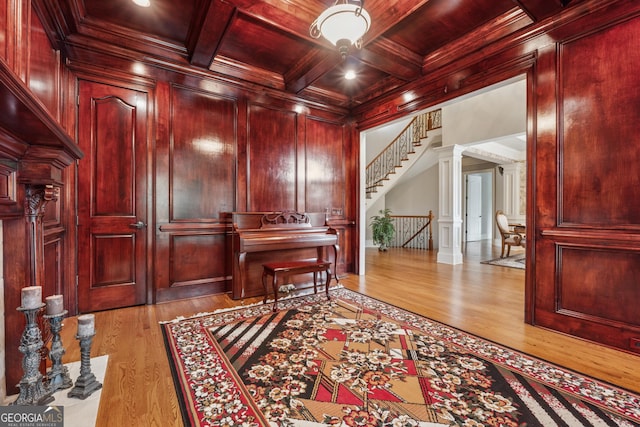 3410 Enclave Mill Ct, Dacula, GA 30019 - living area with a wooden ceiling with exposed beams, wood finished floors, stairs, and crown molding