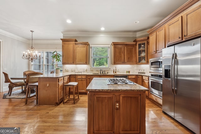 3410 Enclave Mill Ct, Dacula, GA 30019 - kitchen featuring stainless steel appliances, a peninsula, glass insert cabinets, light stone countertops, and brown cabinetry