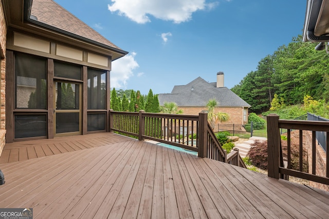 3410 Enclave Mill Ct, Dacula, GA 30019 - deck featuring a sunroom
