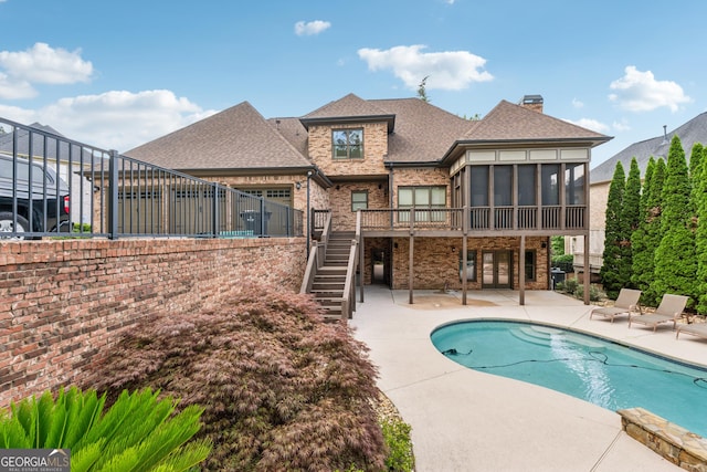 3410 Enclave Mill Ct, Dacula, GA 30019 - swimming pool featuring stairs, a patio, and a sunroom