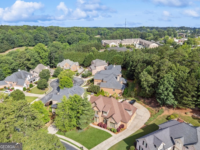 3410 Enclave Mill Ct, Dacula, GA 30019 - aerial overview of property's location with nearby suburban area and a forest
