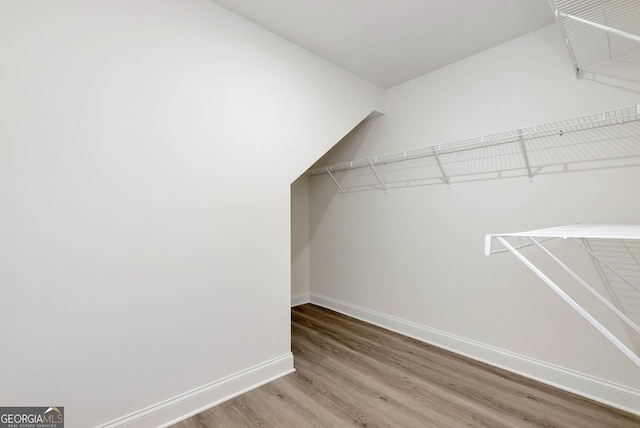 797 Ode Peppers Rd, Winder, GA 30680 - spacious closet featuring wood finished floors