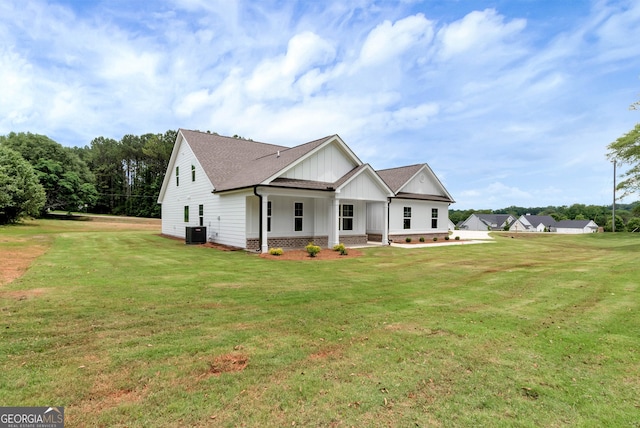 797 Ode Peppers Rd, Winder, GA 30680 - modern inspired farmhouse with board and batten siding, roof with shingles, and a front lawn