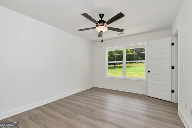 797 Ode Peppers Rd, Winder, GA 30680 - unfurnished room with ceiling fan and light wood-style flooring