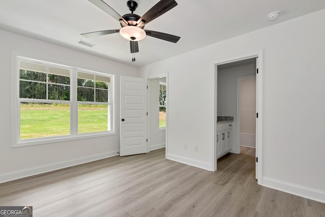 797 Ode Peppers Rd, Winder, GA 30680 - unfurnished bedroom featuring light wood-type flooring and ceiling fan